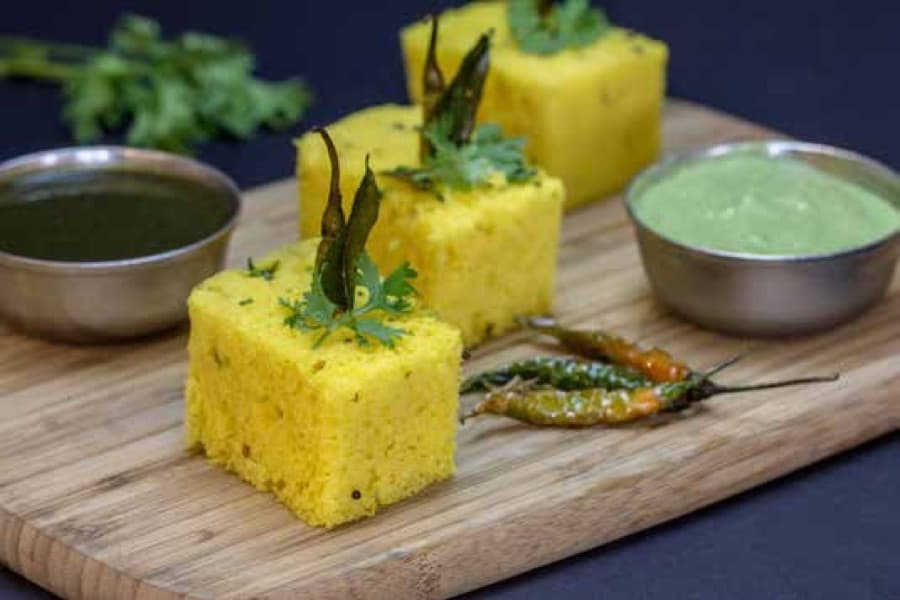 An assortment of Indian savouries and snacks prepared by Cater Inc.