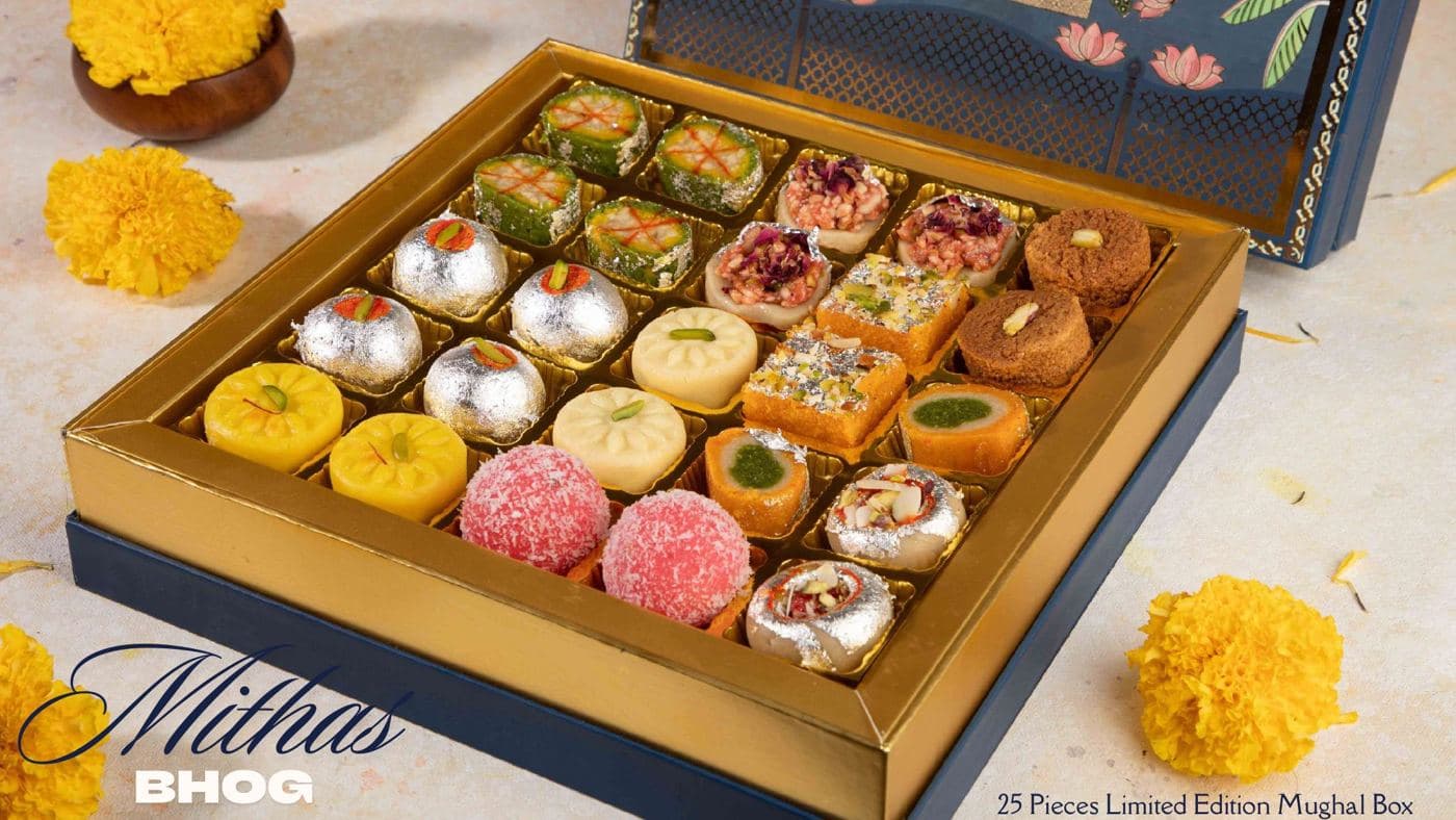 The Mithas Bhog limited edition box from Chhappan Bhog, twenty-five hand-finished sweets in a blue and gold box