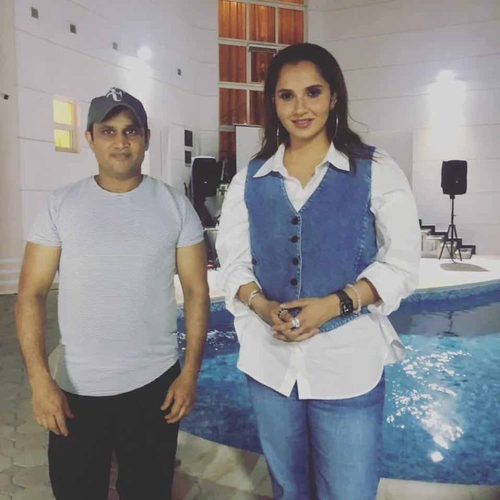 Cater Inc. team member with tennis champion Sania Mirza